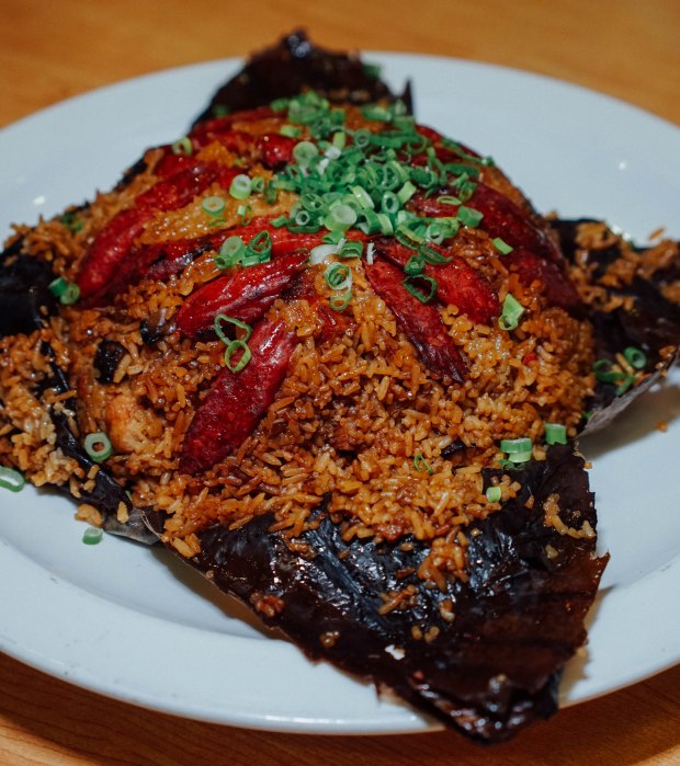famous-kitchen-fried-rice-with-waxed-meat-in-lotus-leaf